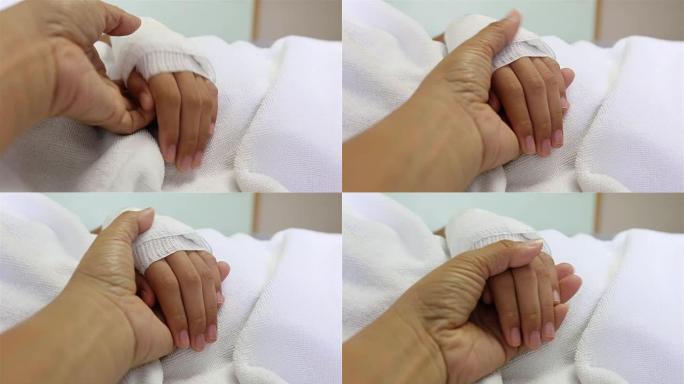 病人手中的静脉注射溶液。专注于手