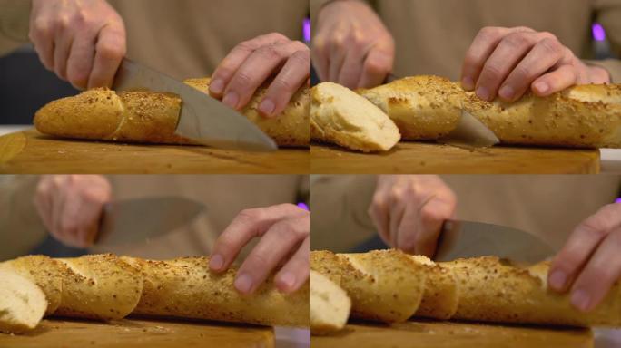 用锋利的钢刀切开新鲜出炉的脆皮面包特写，食物