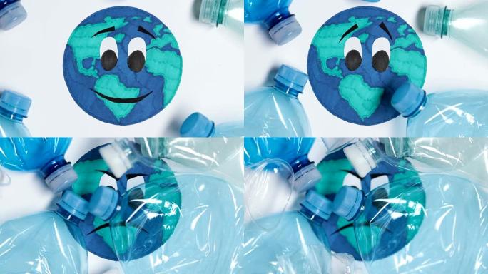 地球星球图片上丢弃的塑料瓶，环境污染概念