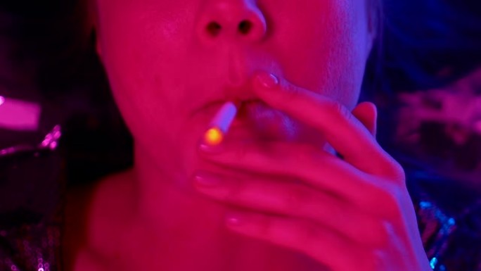 年轻女子在夜总会聚会上抽烟，尼古丁成瘾，特写镜头