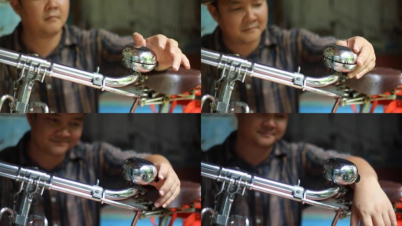 男子修理自行车铃车把铃铛特写镜头童年回忆
