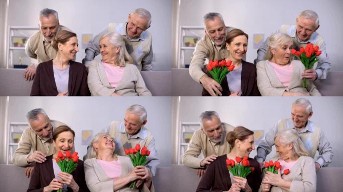 国际妇女节，老人向敬爱的女士赠送一束郁金香