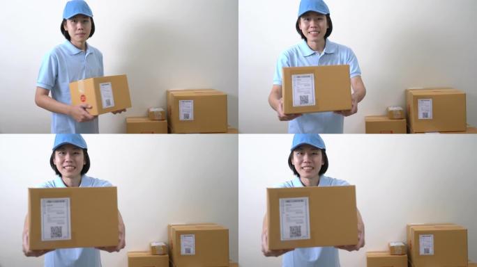 亚洲送货员给包裹箱