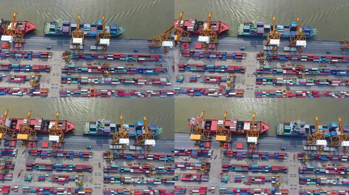 船厂带工作起重机桥的集装箱货运船