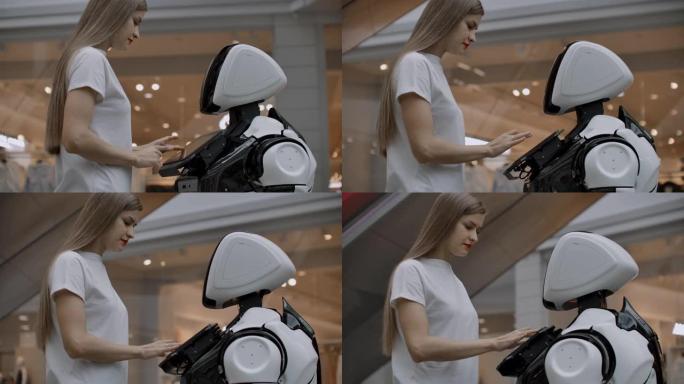 一位女程序员测试机器人与用户互动的能力。在办公室里使用机器人助手。机器人给女孩帮助。
