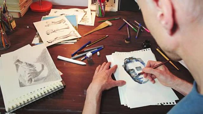 艺术家使用墨水法绘画。