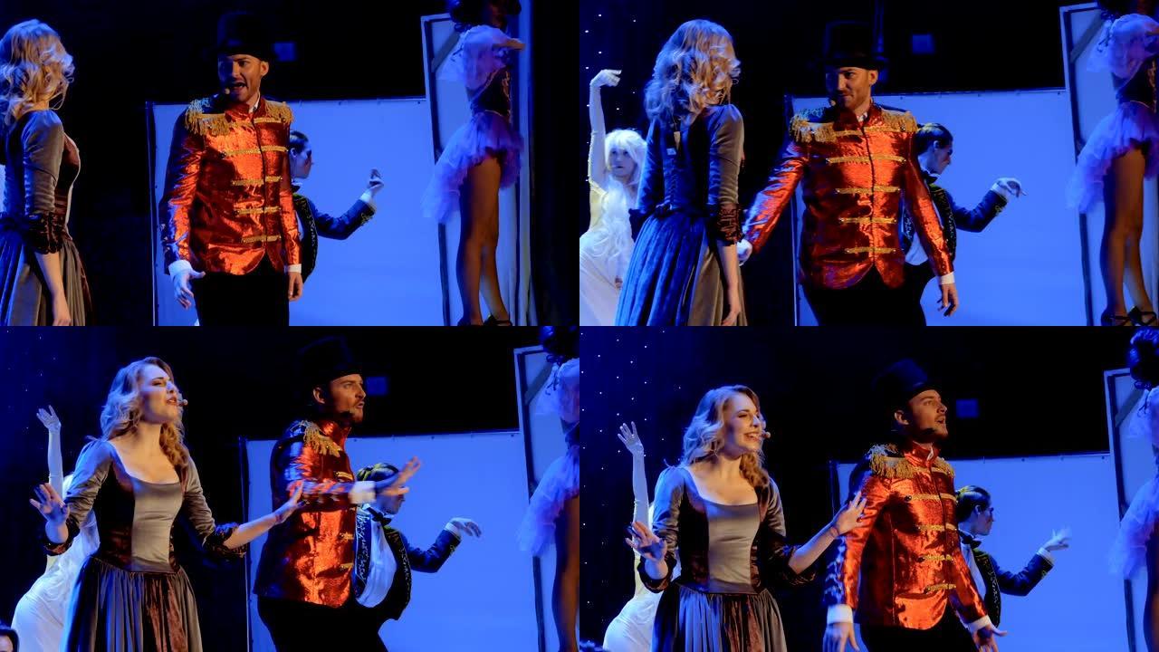 美女在剧场的舞台上与帅哥一起唱歌