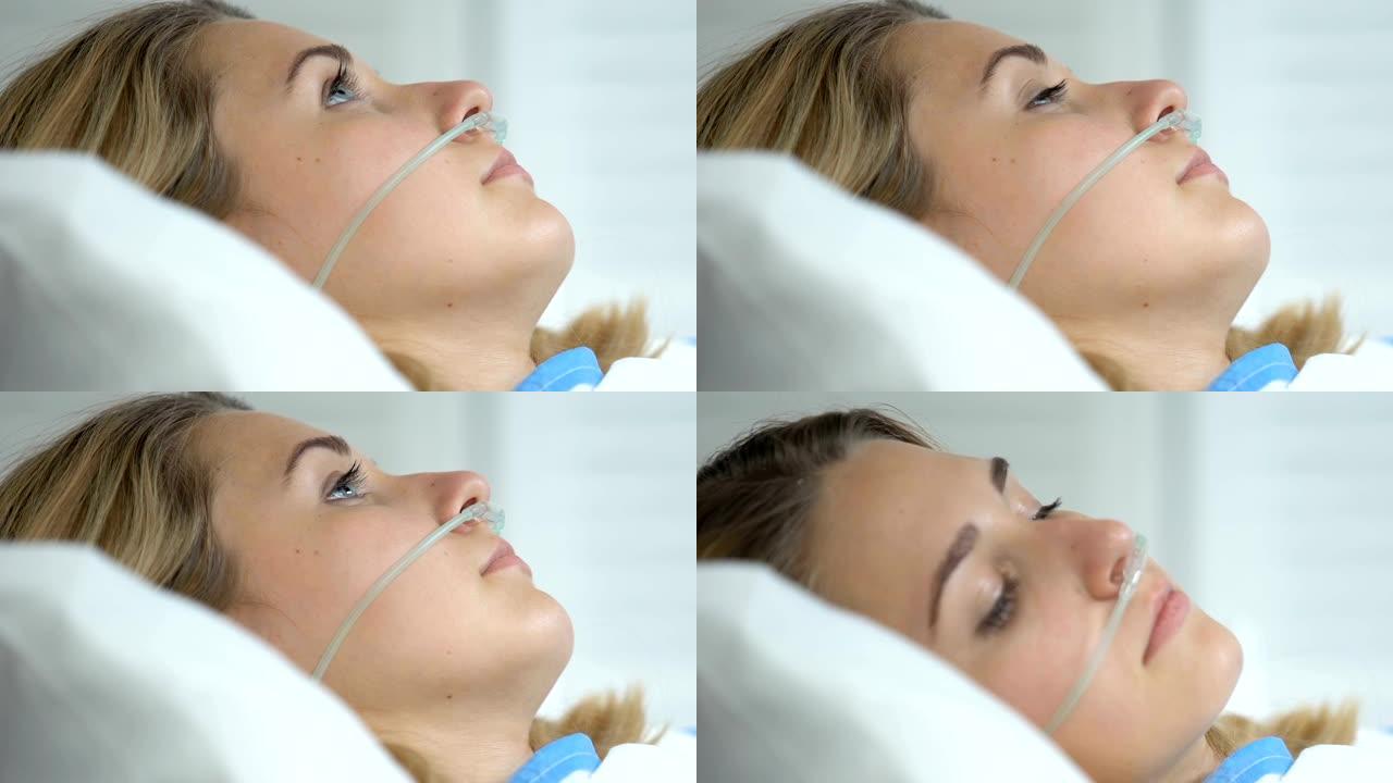 女性住院患者用鼻套管卧床，氧疗，康复