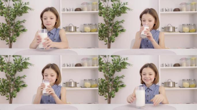 快乐的女学生喝玻璃牛奶，维生素和矿物质，钙