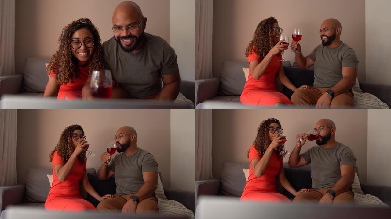 夫妻在虚拟的欢乐时光里喝酒