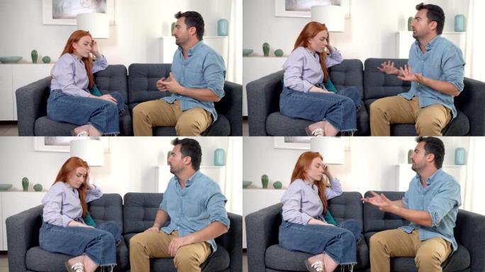 这段视频是关于愤怒和悲伤的夫妇在沙发上争吵的