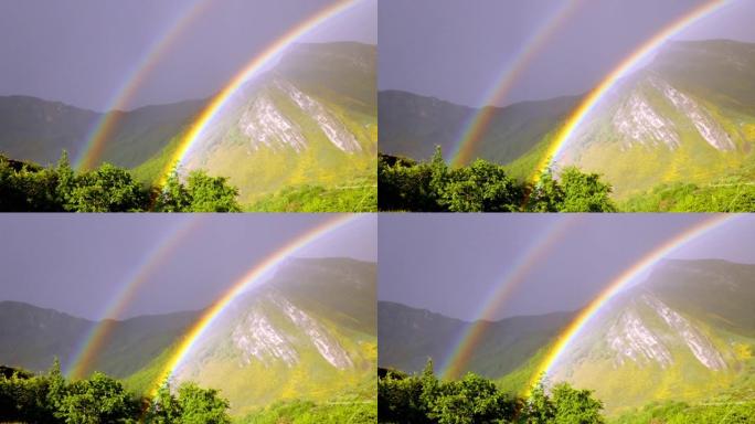 双彩虹的静态镜头，背后有山