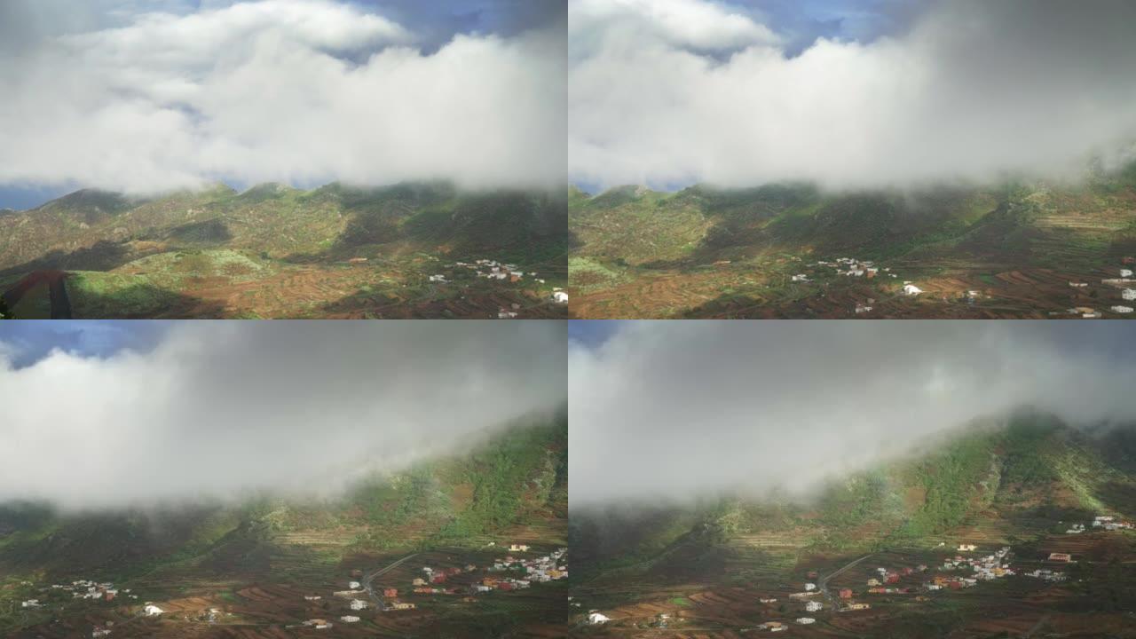 山中隐藏的村庄云雾缭绕云山雾罩光照洒满大