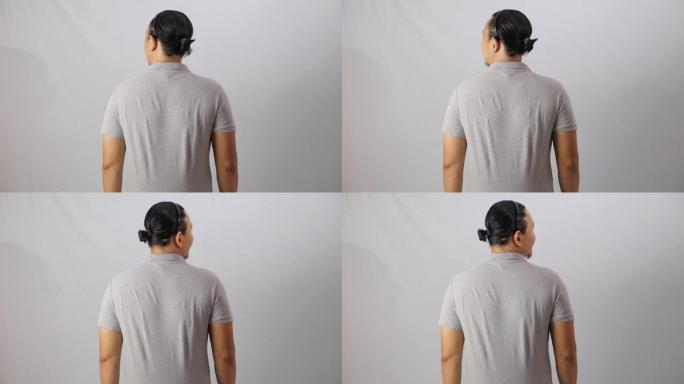 空白领衬衫模型模板，后视图，亚洲男模穿着纯灰色t恤孤立在白色。Polo t恤设计模型演示