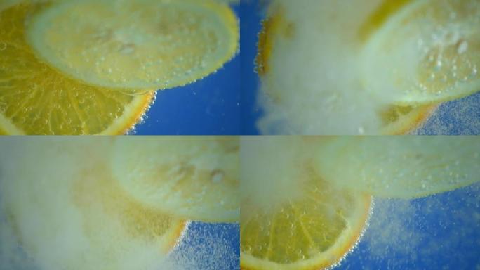 苏打水中的慢动作柠檬滴