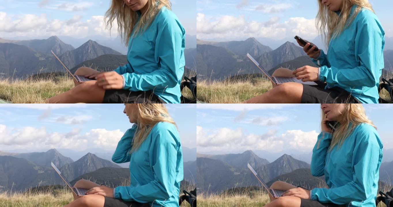 年轻女子在远足时使用笔记本电脑
