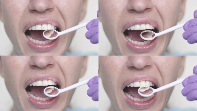 牙医柜里的女人用口腔镜检查牙齿健康，显示如何使用牙签牙线