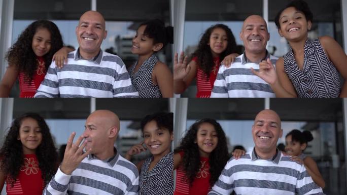 聋哑的父亲和女儿在家做视频通话 -- 网络摄像头的观点