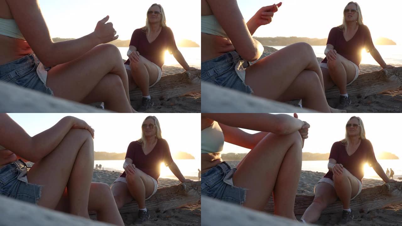妇女在海滩上交谈的特写镜头