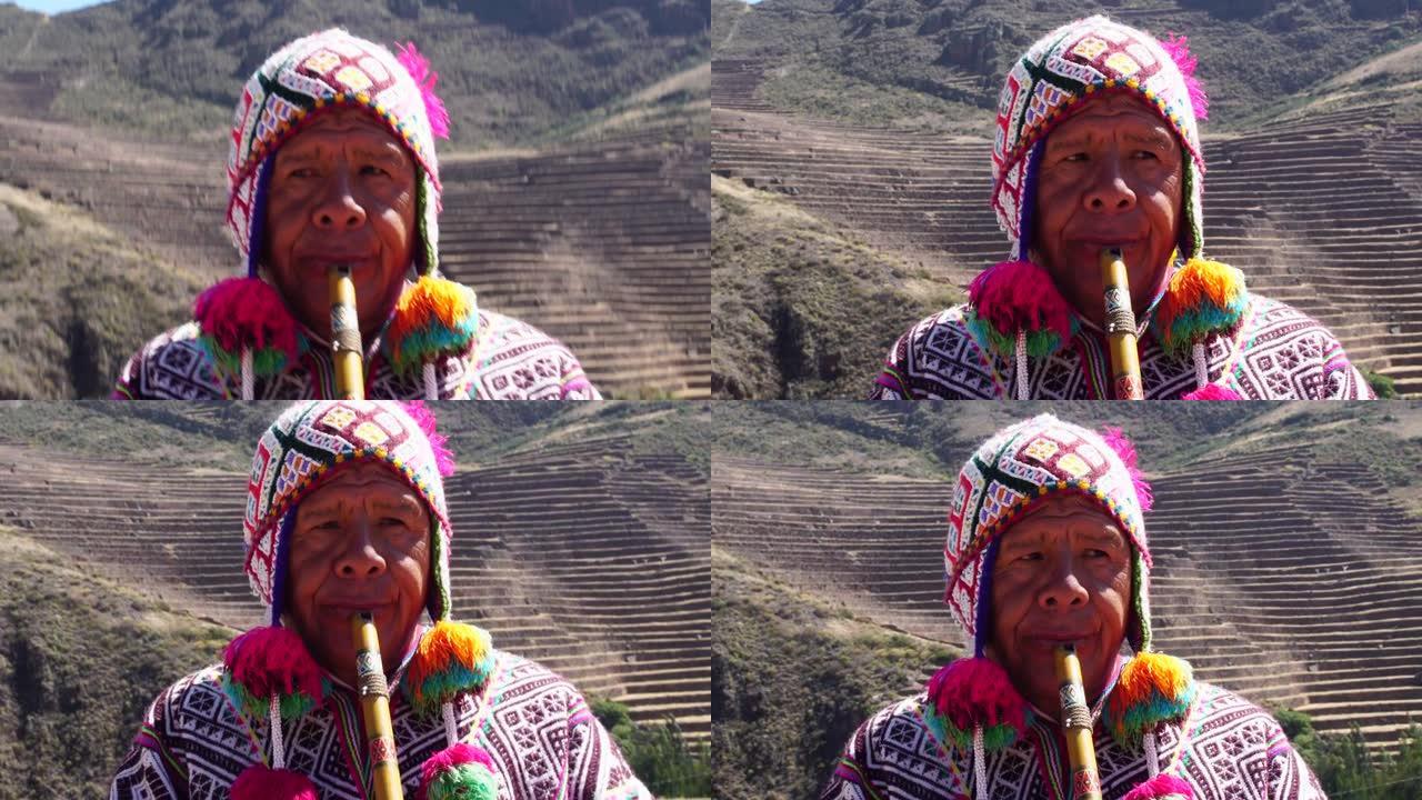 穿着秘鲁传统服装和吹笛子的高级男子