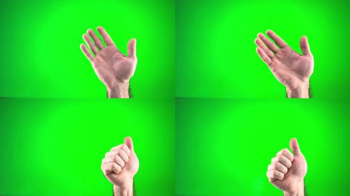 一名男子在绿色背景上挥手，手特写，然后显示班拇指向上，男性手势孤立在明亮的绿色屏幕背景。在色度键屏幕