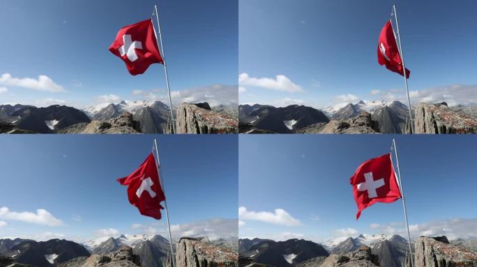 从山顶飘扬的瑞士国旗的风景