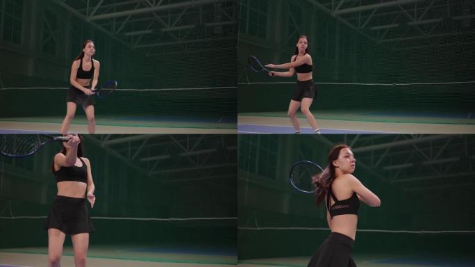 年轻女子在室内球场上打网球，用球拍击球，在比赛中慢动作