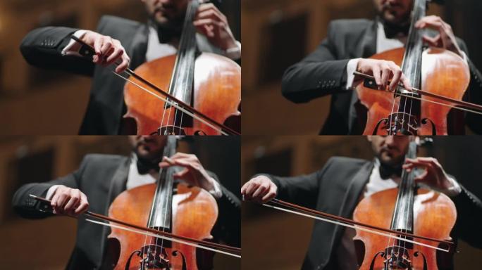 受启发的音乐家正在歌剧院大厅演奏大提琴，排练或古典音乐音乐会，特写镜头