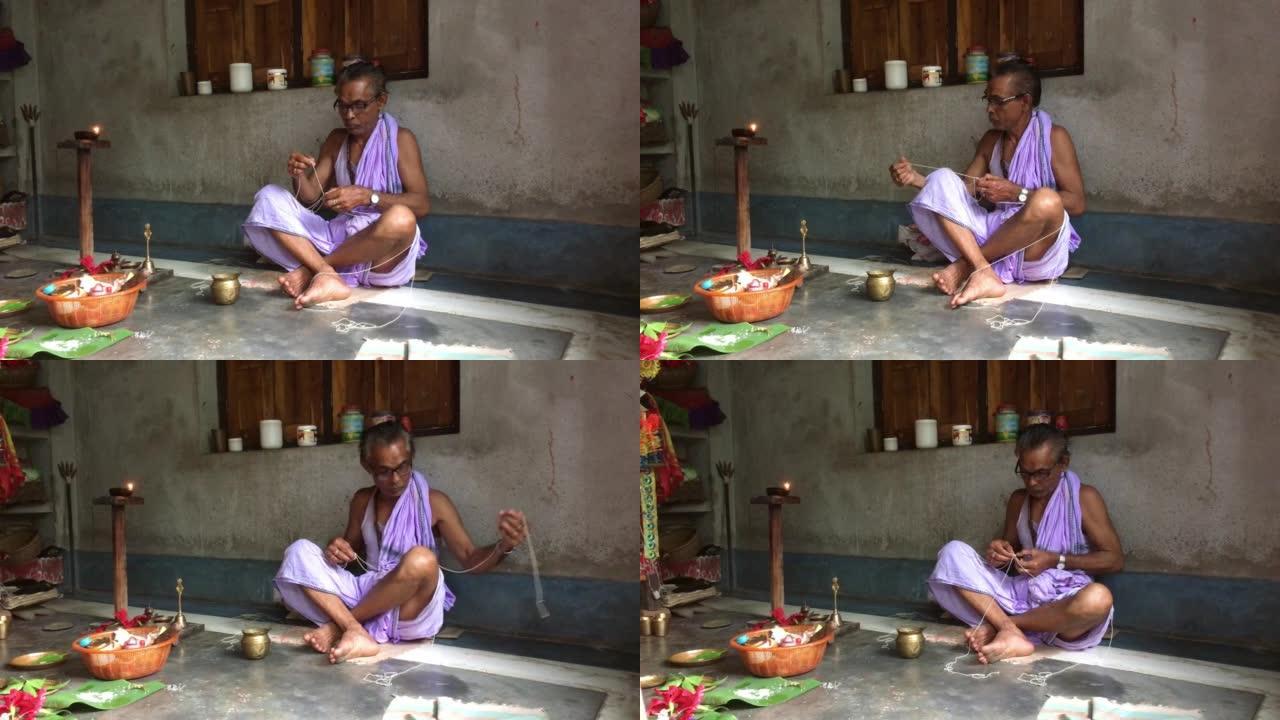 印度教婆罗门神父 (purohit，pandit或pujari) 制作神圣的线或yajnopavit