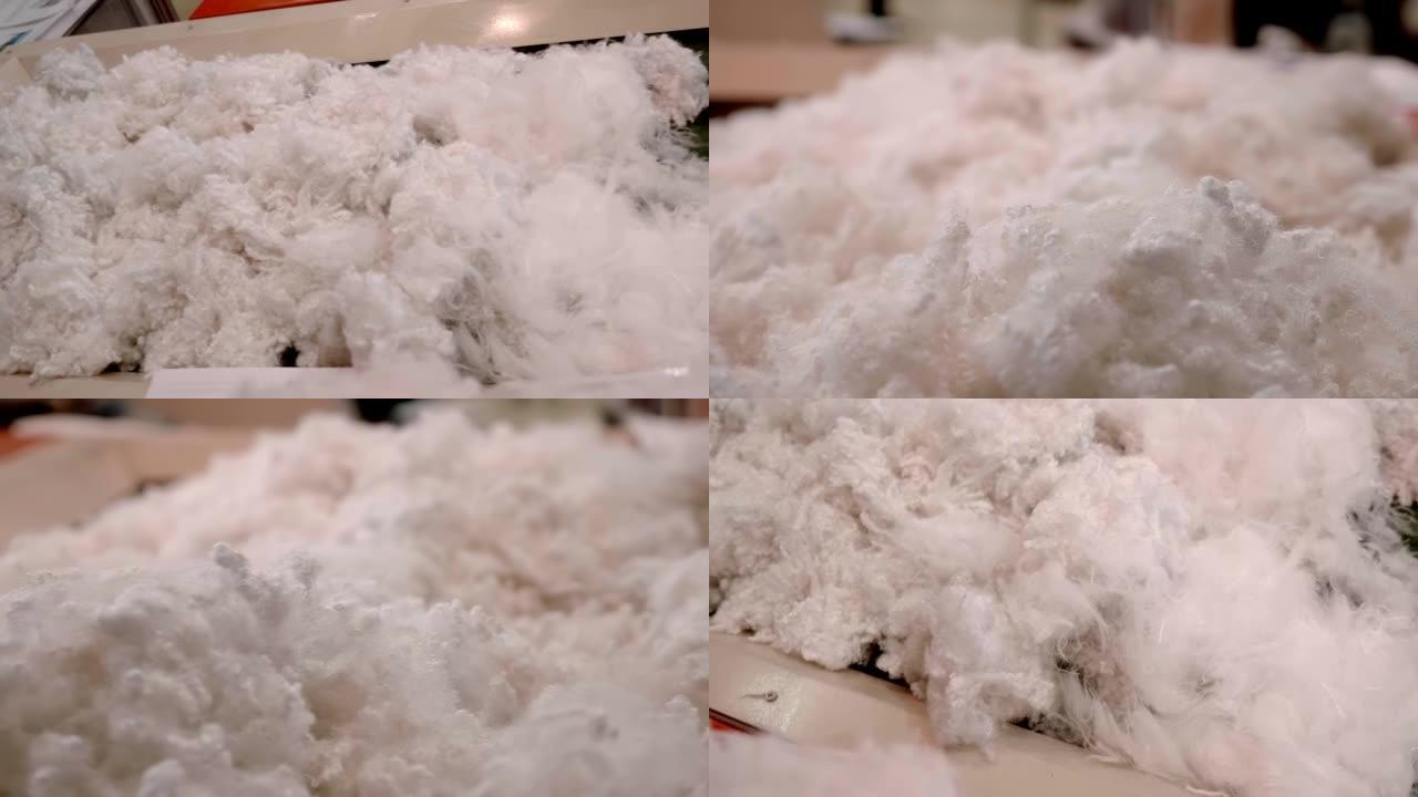 天然，未加工的原棉在生产织物的工厂