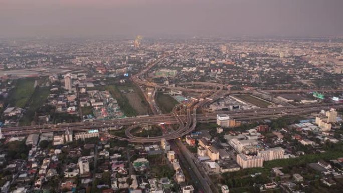 曼谷城市交通街路口空中全景4k延时泰国黄昏飞行