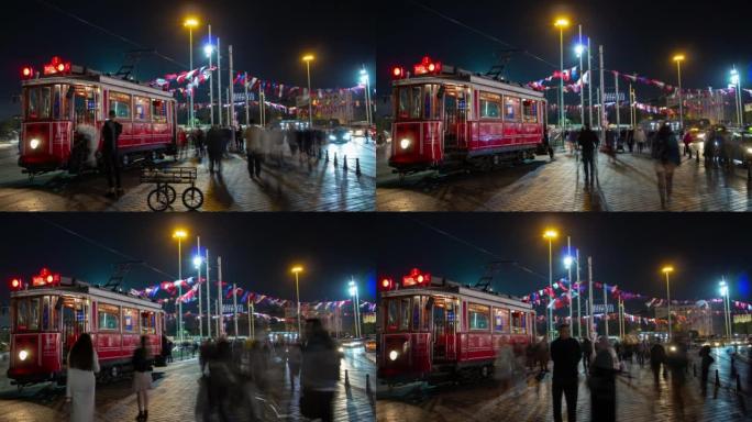 夜间照明伊斯坦布尔市中心著名电车站拥挤广场全景4k延时土耳其