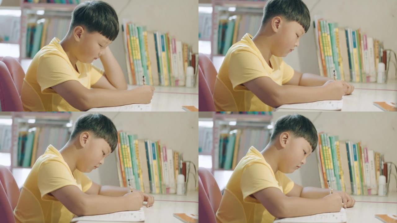 男孩做作业时感到疲倦，孩子近视。