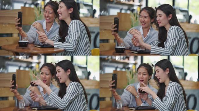 亚洲女性情侣在咖啡店约会