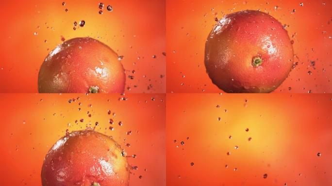 橙色背景下的葡萄柚在慢动作中的飞行