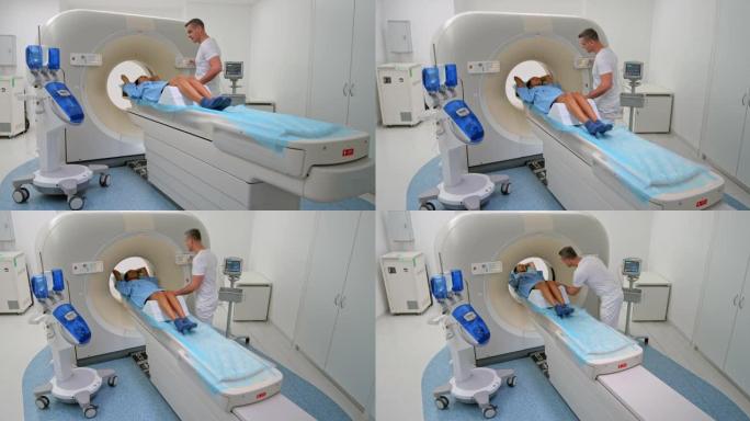 CS男性猫放射技术专家将其女性患者滑入猫扫描仪