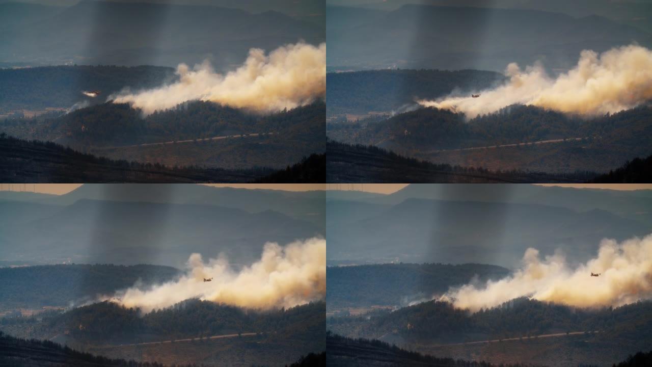 消防员飞机飞越燃烧的山林落水
