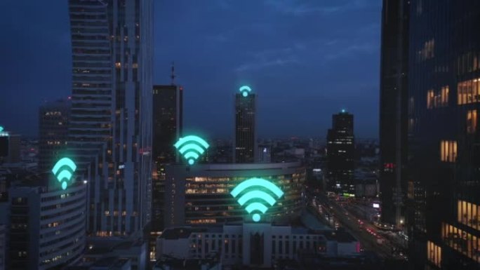 带有高层建筑的现代城市自治市镇的傍晚航拍画面。电脑增加了建筑物上方发光的Wifi符号。波兰华沙