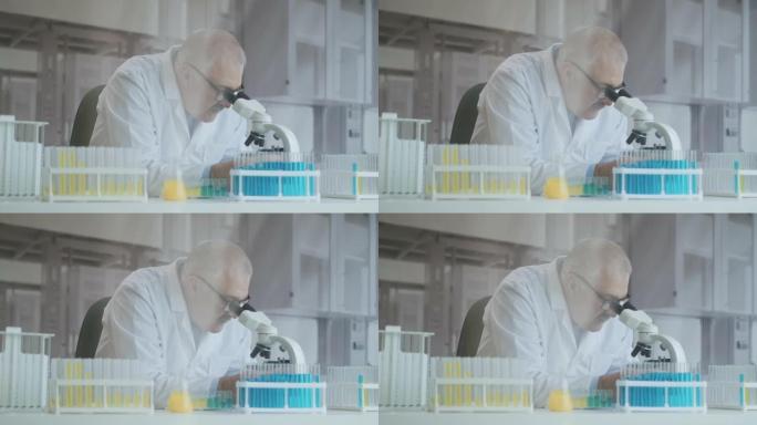 留着胡须的白人男性研究人员戴着防护眼镜，并使用显微镜spba进行工作。科学家在实验室使用显微镜。搜索