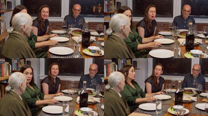 逾越节晚餐前，犹太家庭在餐桌上聊天