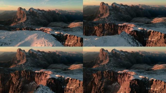 雪山山脊、山顶和绿色山谷的空中风景