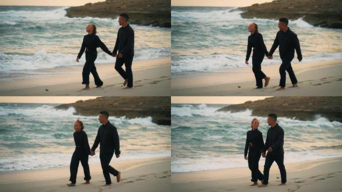 恋爱中的非洲民族浪漫情侣。阳光明媚的日子在海滩上浪漫散步