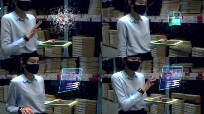 亚洲女性在仓库的平板电脑检查工作中使用全息图大数据保护程序。