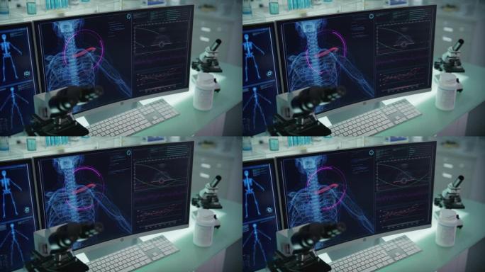 拥有计算机和显微镜的现代化实验室。带有动画人体模型的屏幕。扫描虚拟病人是否受伤。带红色市场的肩膀
