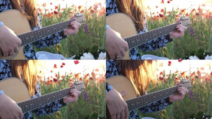 女人喜欢在大自然的日落日在阳光下弹吉他。