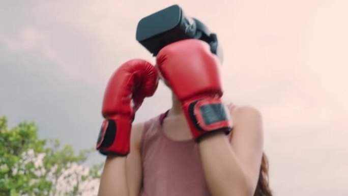 户外虚拟现实耳机拳击中的美丽女性