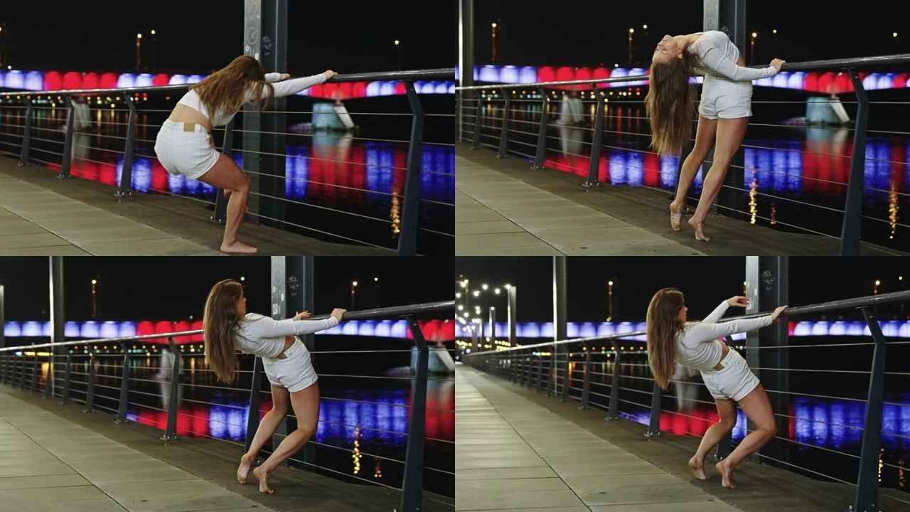 年轻女子在潮湿的城市街道上表演自由式舞蹈。