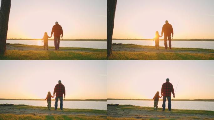 徒步旅行到河边，小男孩和他的祖父正在步行到海岸钓鱼，在日落时间在大自然中休息