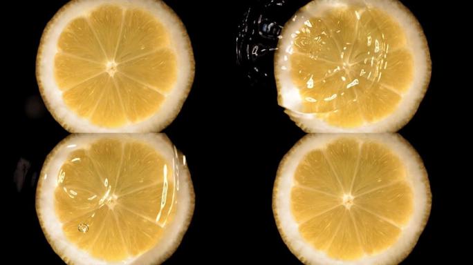 柠檬片上落水的超慢动作。在高速电影摄影机上拍摄