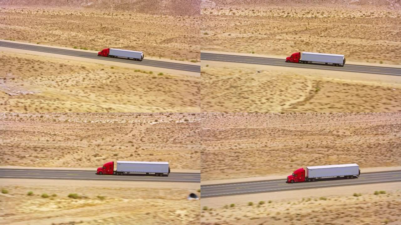 AERIAL跟随一辆卡车在美国内华达州的高速公路上行驶